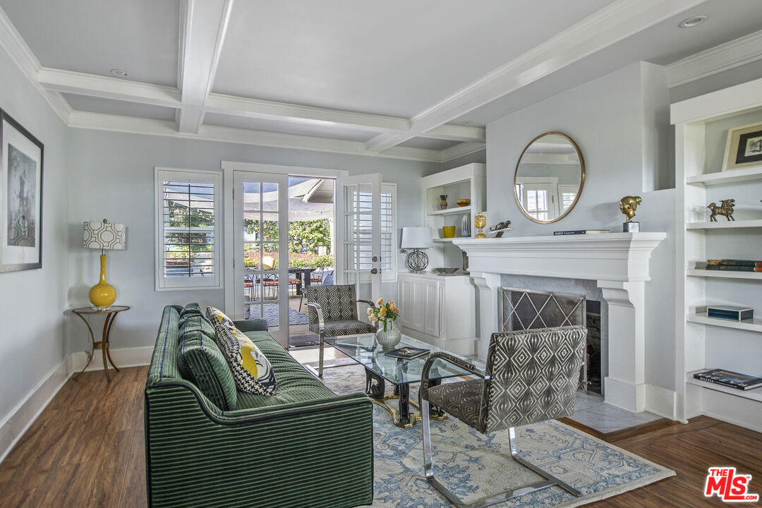 55 West Altadena Drive Altadena, CA 91001 - Photo 8 of 42 a living room with furniture a fireplace and large windows