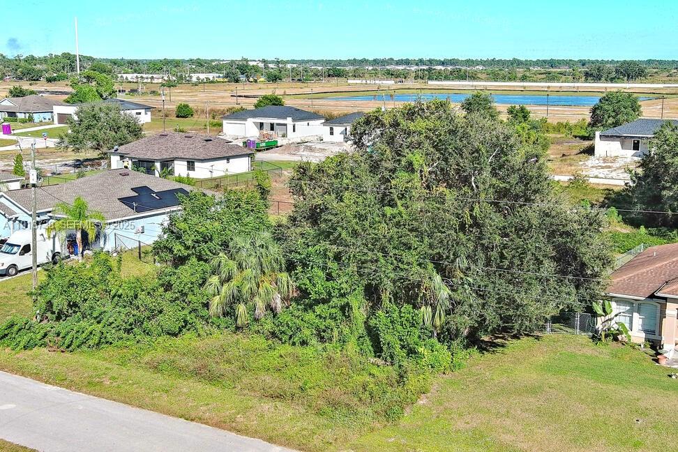 341 Ranchito Avenue Lehigh Acres, FL 33974 - Photo 4 of 22 a view of lake with outdoor space