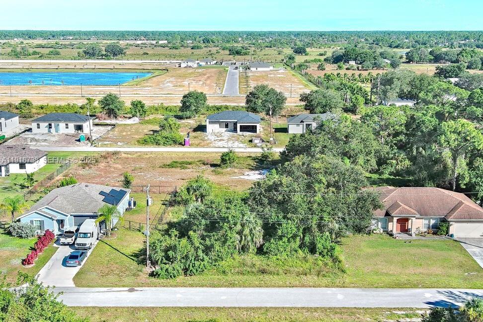 341 Ranchito Avenue Lehigh Acres, FL 33974 - Photo 9 of 22 a view of lake view and mountain view