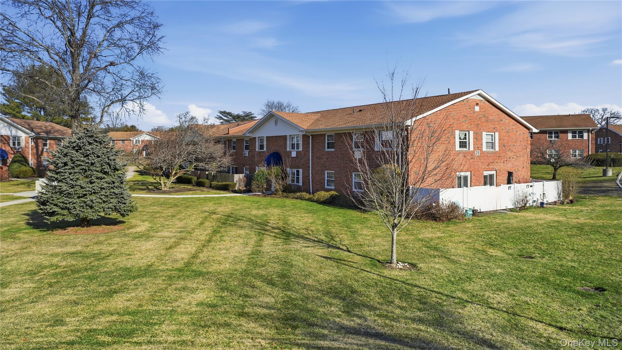 460 Old Town Road, Unit 28A East Setauket, NY 11766 - Photo 18 of 28 a house view with a outdoor space