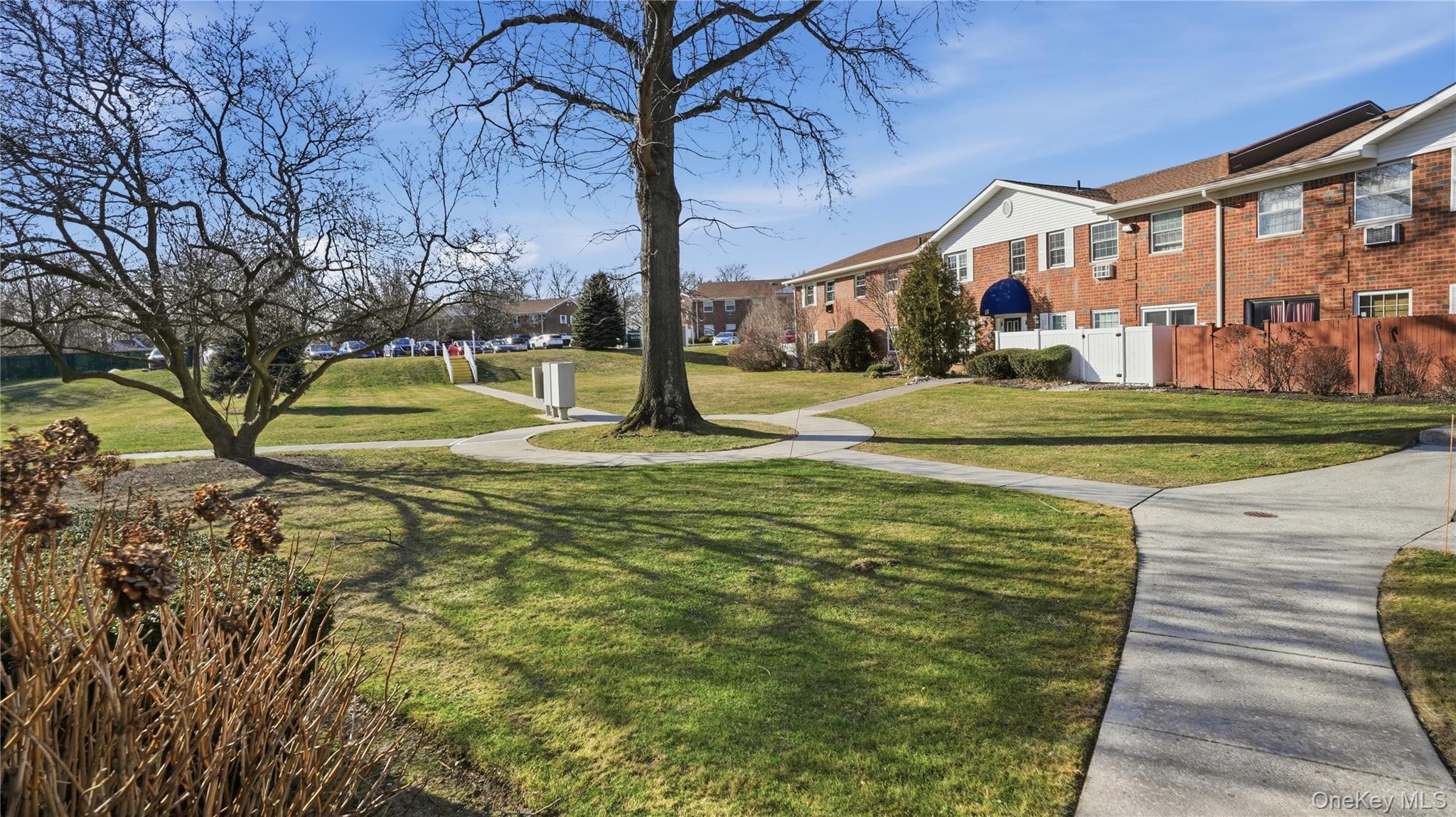 460 Old Town Road, Unit 28A East Setauket, NY 11766 - Photo 3 of 28 a view of a house with a yard