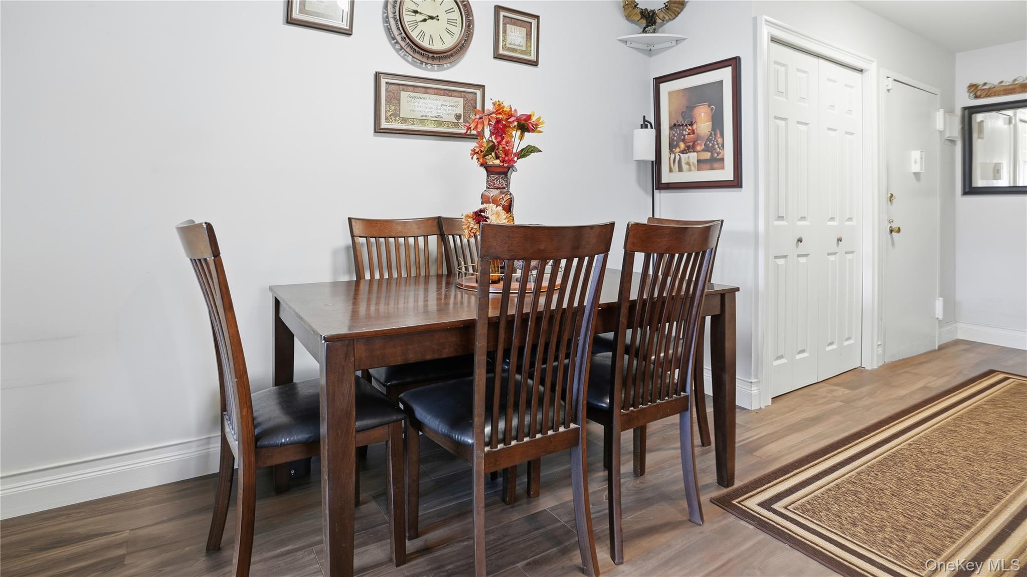 460 Old Town Road, Unit 28A East Setauket, NY 11766 - Photo 8 of 28 a view of a dining room with furniture