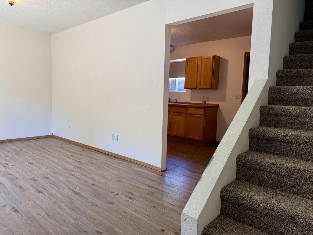 614 South Main Street Riggins, ID 83549 - Photo 40 of 70 Unit B entrance to living room - stairs - kitchen, Unit B entrance to living room - stairs - kitchen