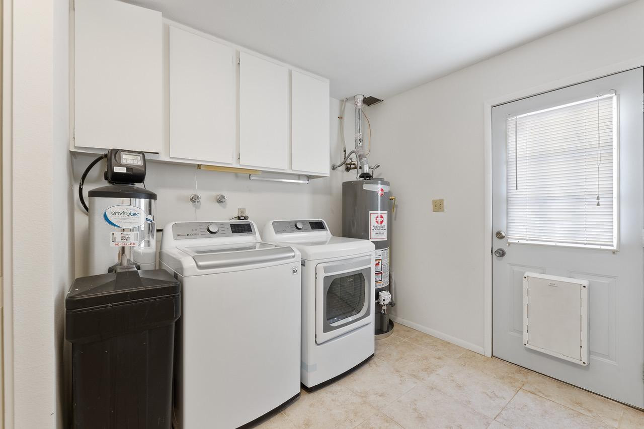 8307 East Arlington Road Scottsdale, AZ 85250 - Photo 25 of 25 a view of a storage and utility room with washer and dryer