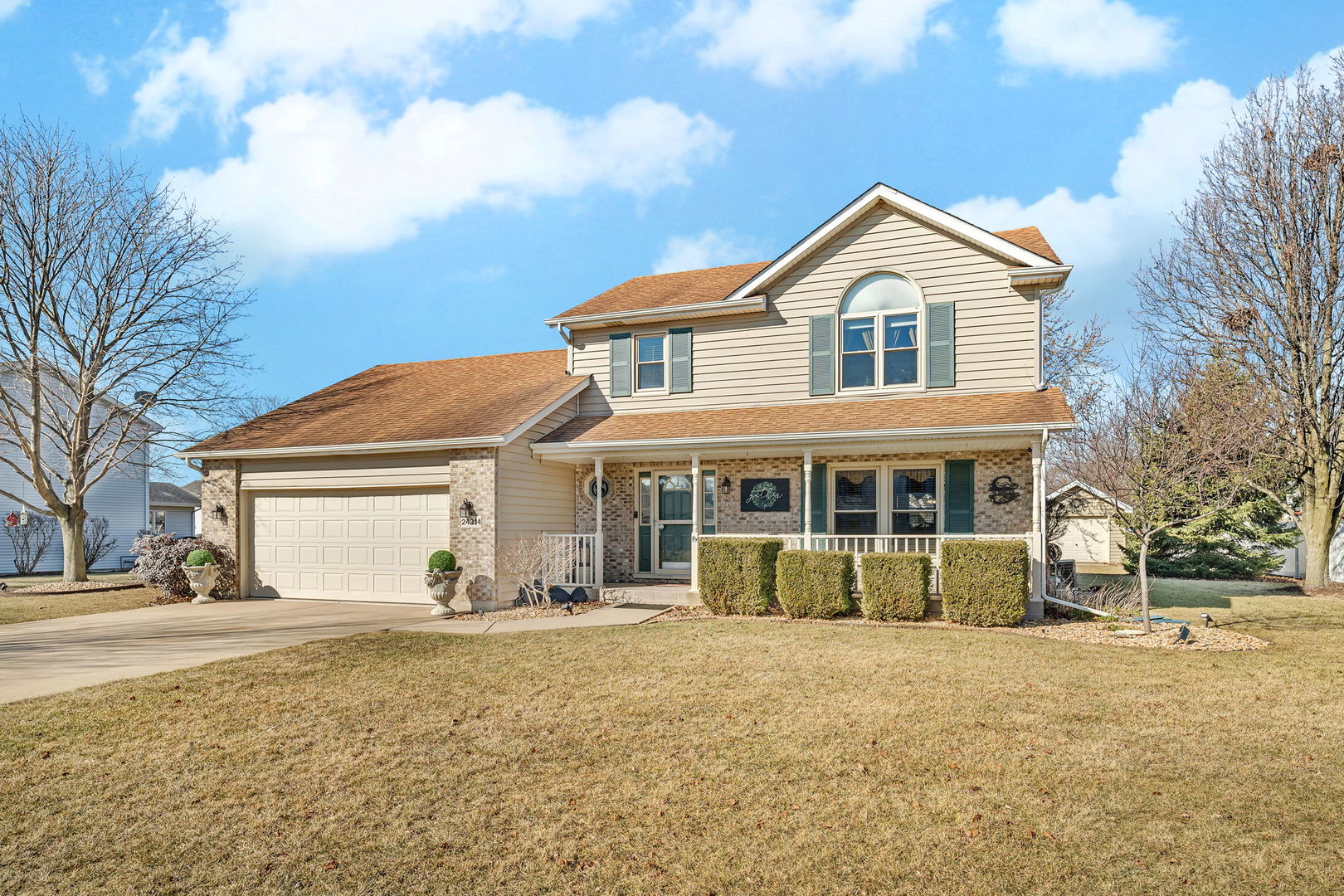 24314 South Cree Drive Channahon, IL 60410 - Photo 1 of 33 a front view of a house with a yard