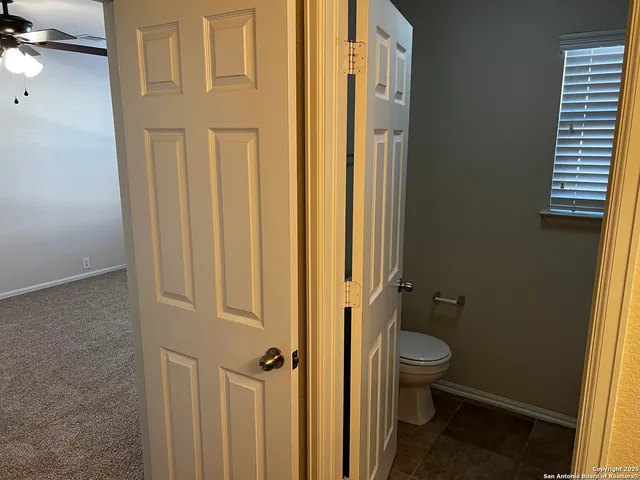 a bathroom with a toilet