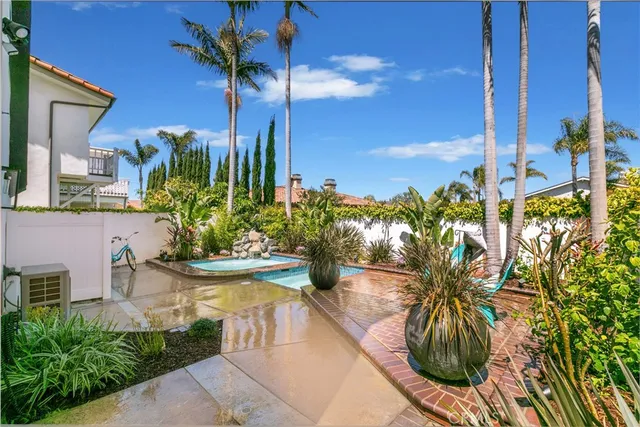 a view of a potted flower in front of a door