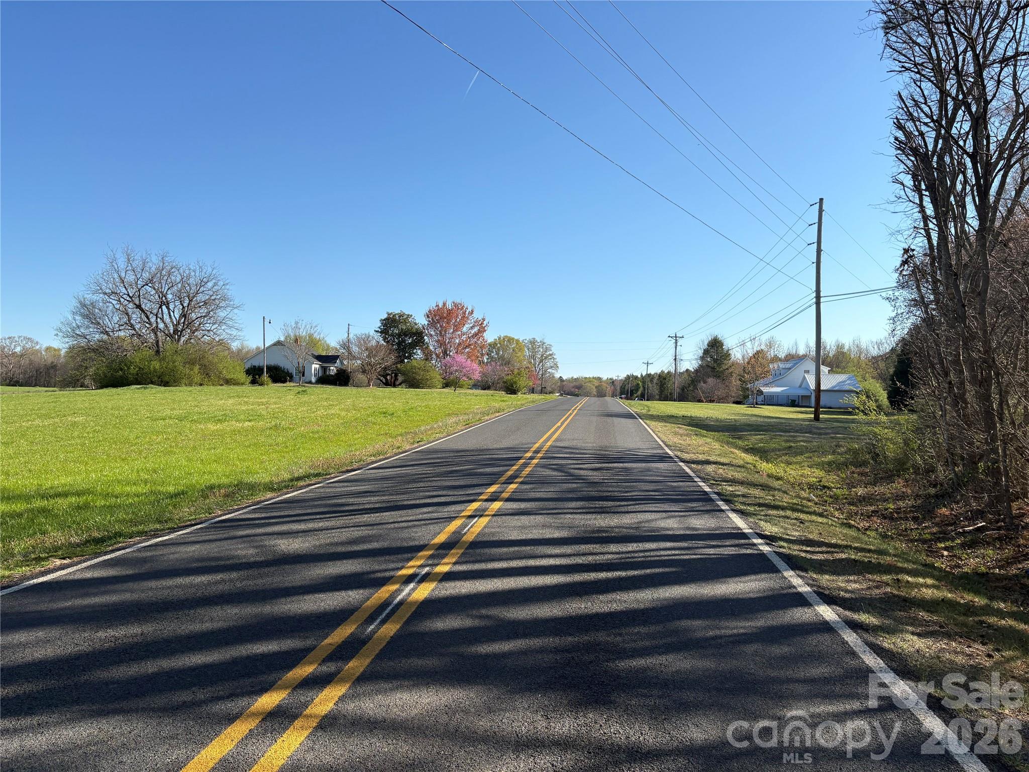 0 Silver Road Oakboro, NC 28129 - Photo 4 of 17 a park view with a bench in the background
