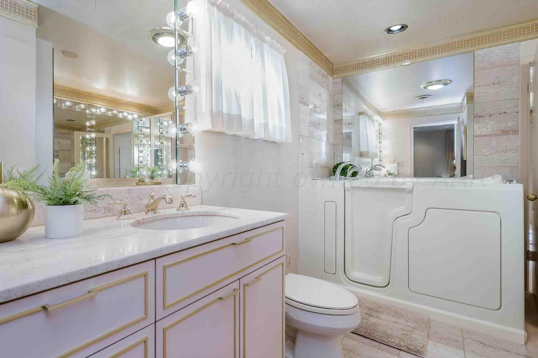 7517 Duling Lane Amarillo, TX 79110 - Photo 24 of 80 a bathroom with a granite countertop sink a toilet and mirror