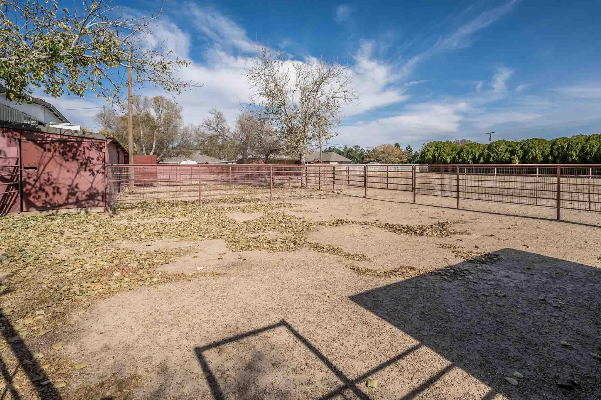 7517 Duling Lane Amarillo, TX 79110 - Photo 57 of 80 a view of a yard with wooden fence