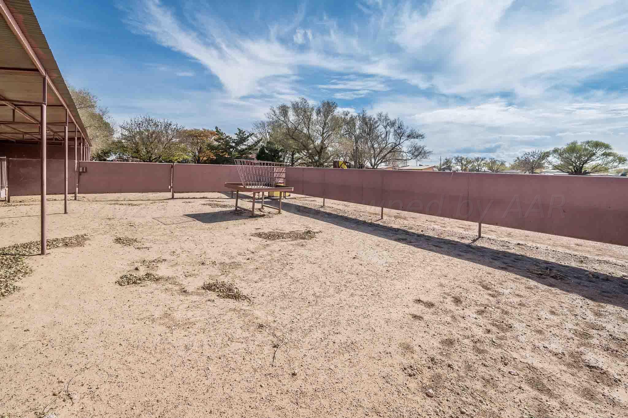 7517 Duling Lane Amarillo, TX 79110 - Photo 74 of 80 a view of a dry yard with wooden fence