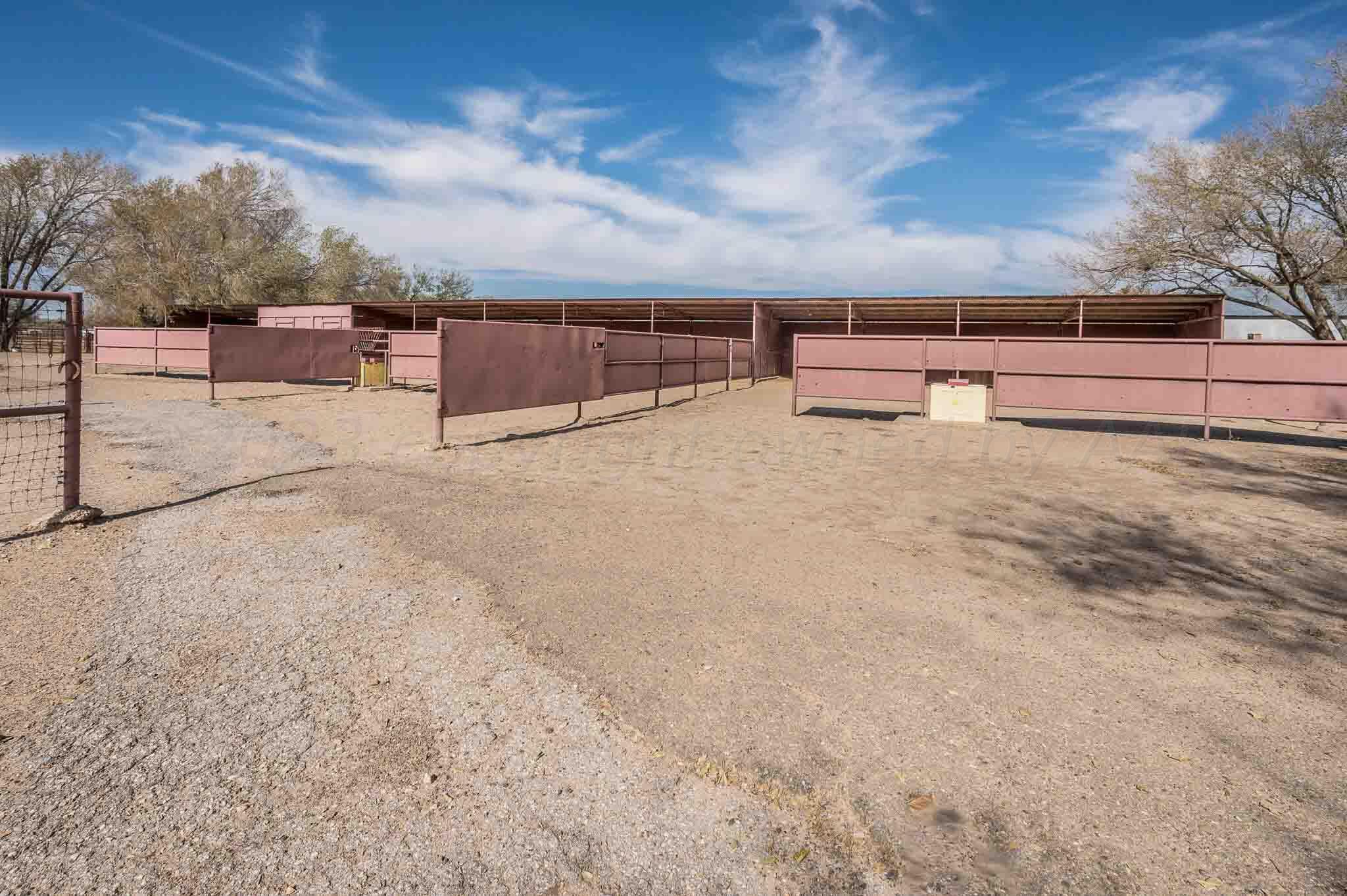 7517 Duling Lane Amarillo, TX 79110 - Photo 75 of 80 a backyard of a house with table and chairs