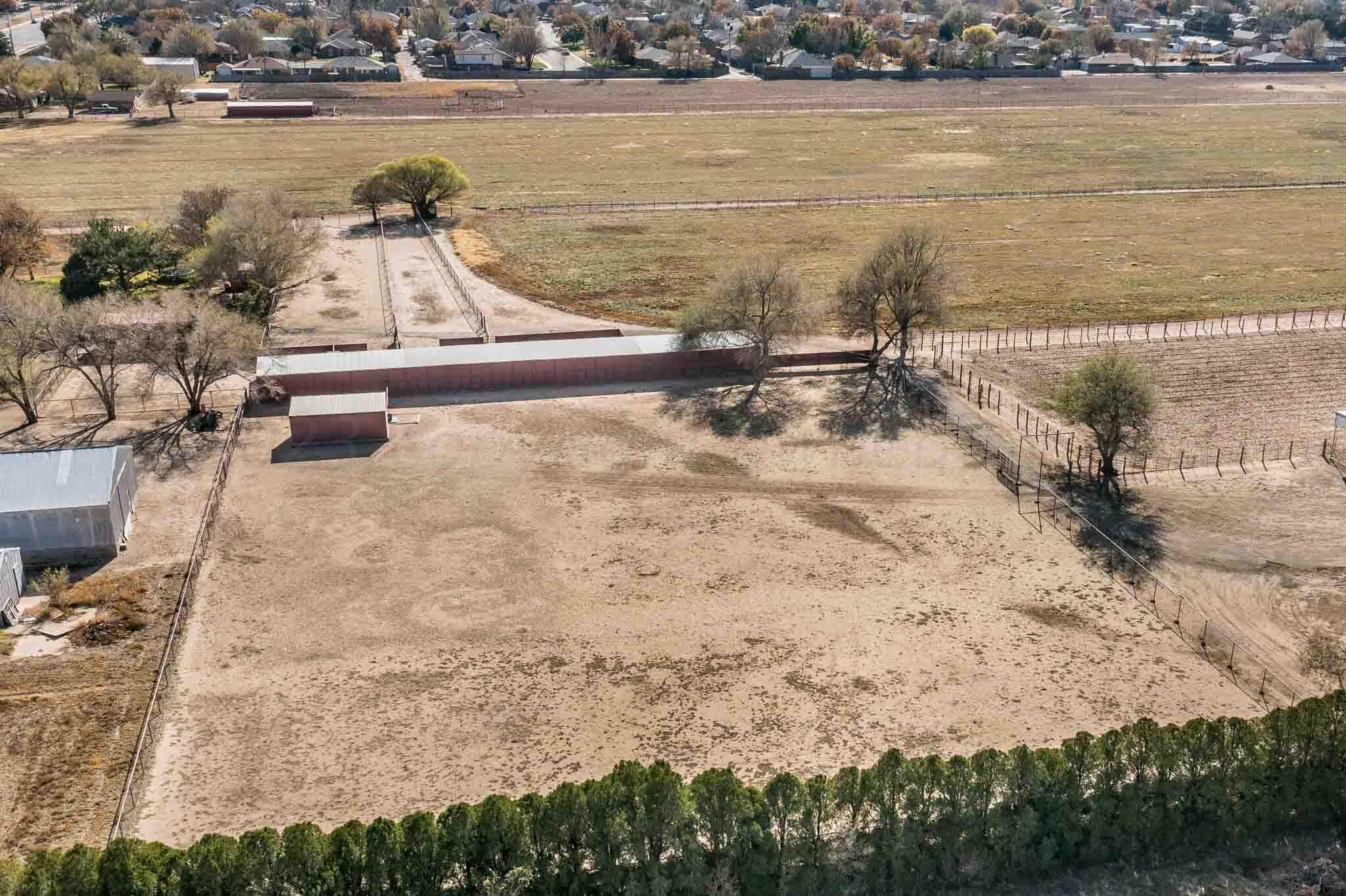 7517 Duling Lane Amarillo, TX 79110 - Photo 77 of 80 a view of a lake with a mountain