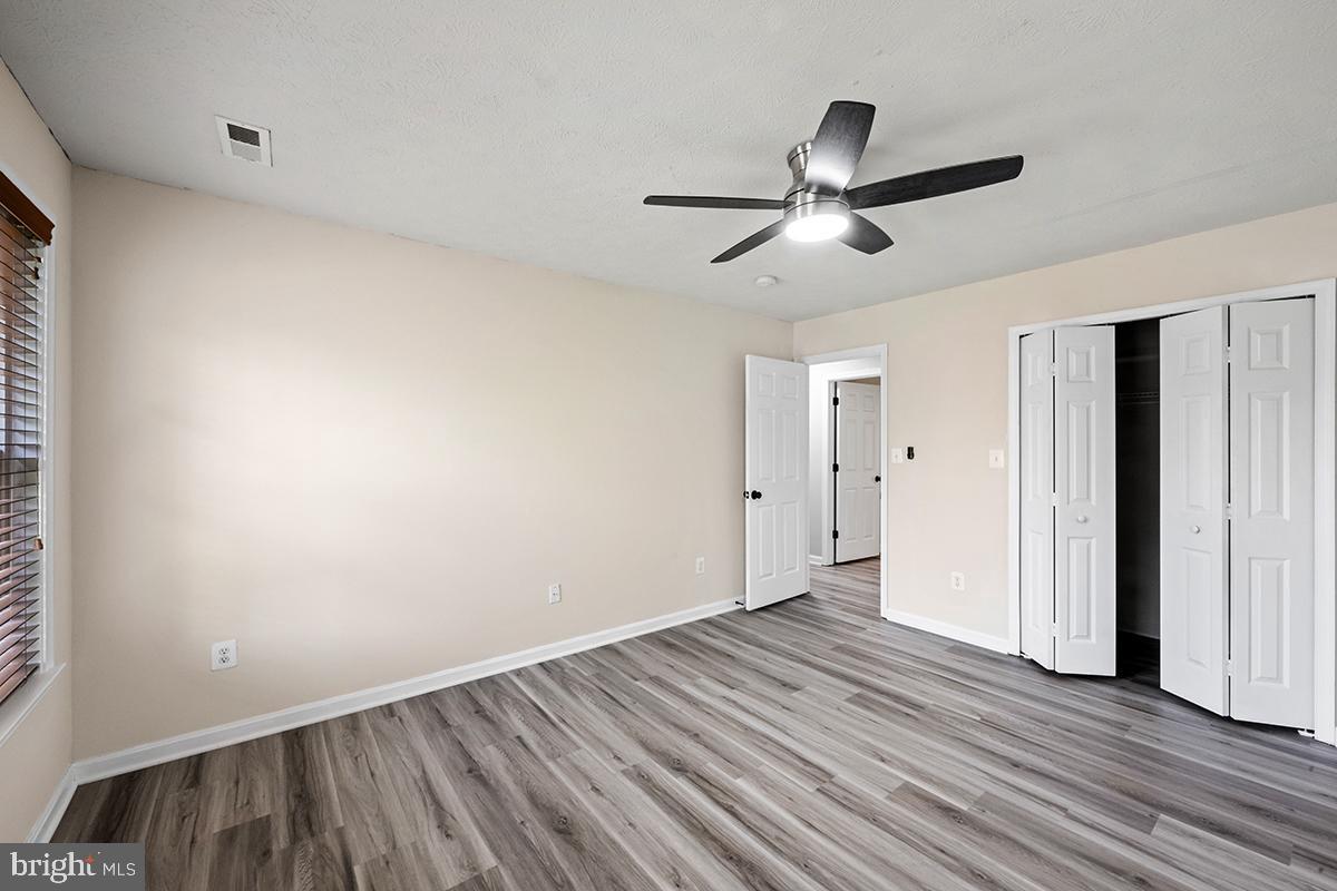 35184 Pheasant Ridge Road Locust Grove, VA 22508 - Photo 8 of 64 a view of empty room with wooden floor