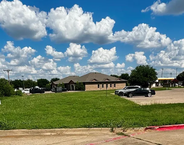 a city street filled with lots of tall buildings