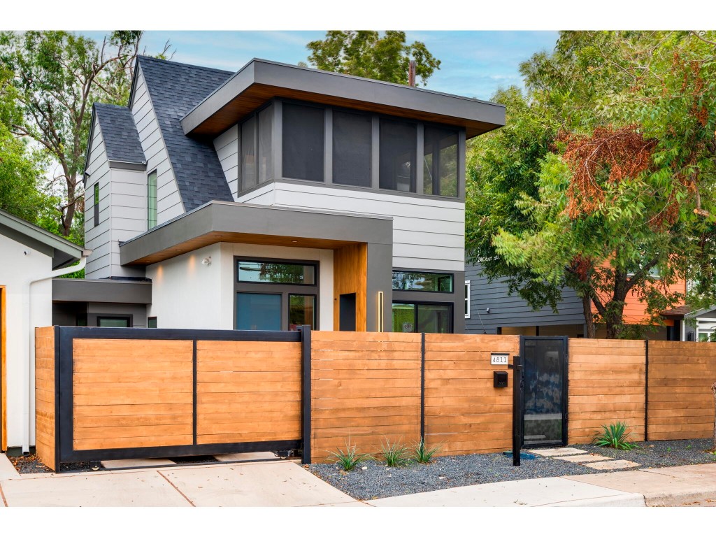 a front view of a house with a garage