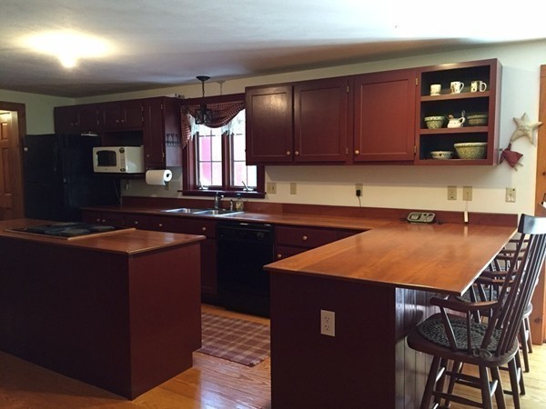 1005 Southbridge Road Warren, MA 01585 - Photo 11 of 30 a kitchen with a sink cabinets and window