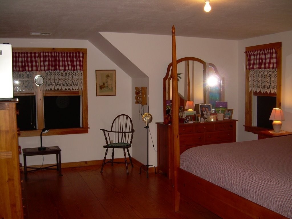 1005 Southbridge Road Warren, MA 01585 - Photo 12 of 30 a view of a livingroom with furniture chandelier and a mirror