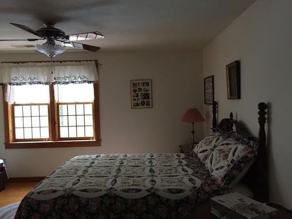 1005 Southbridge Road Warren, MA 01585 - Photo 14 of 30 a bedroom with a bed and window