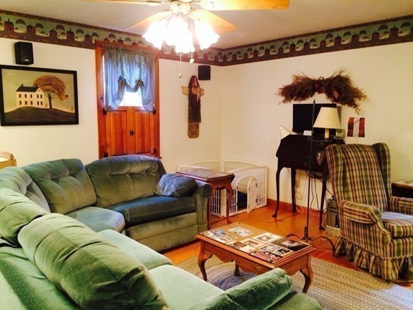 1005 Southbridge Road Warren, MA 01585 - Photo 25 of 30 a living room with furniture and a window