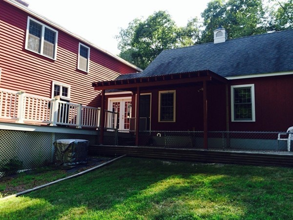 1005 Southbridge Road Warren, MA 01585 - Photo 28 of 30 a front view of a house with a garden