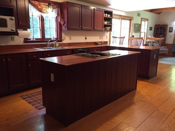 1005 Southbridge Road Warren, MA 01585 - Photo 10 of 30 a kitchen with a sink and cabinets