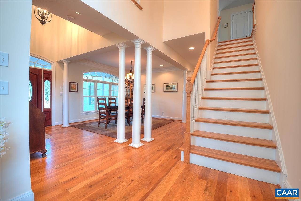 112 Creekside Court Ruckersville, VA 22968 - Photo 26 of 48 a view of entryway and hall with wooden floor