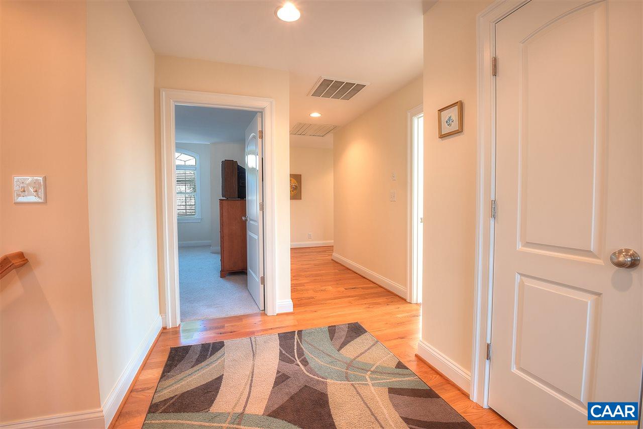 112 Creekside Court Ruckersville, VA 22968 - Photo 27 of 48 a view of a hallway with wooden floor and closet