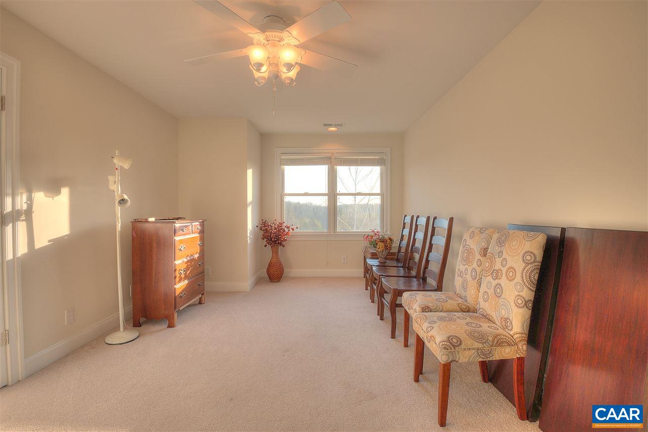 112 Creekside Court Ruckersville, VA 22968 - Photo 33 of 48 a living room with furniture and a window