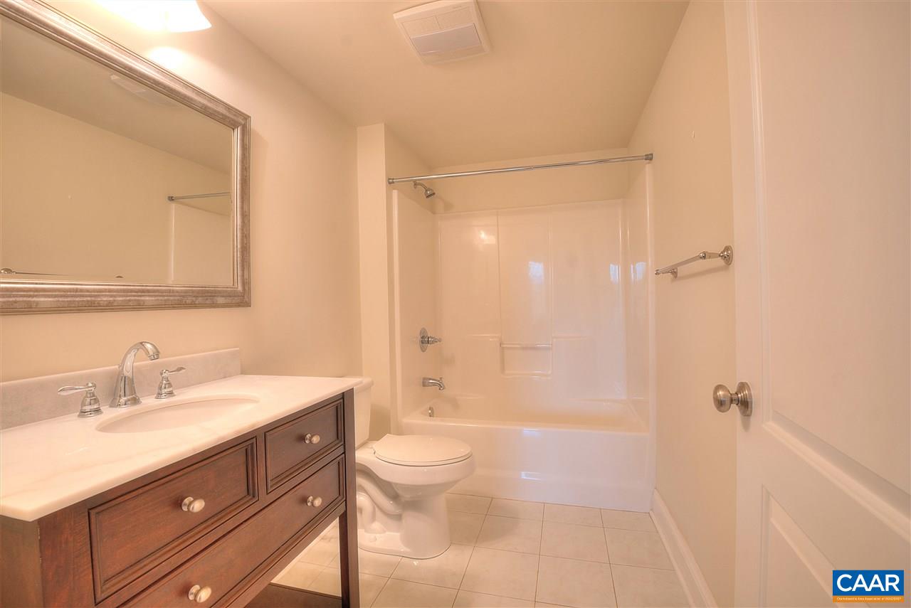 112 Creekside Court Ruckersville, VA 22968 - Photo 41 of 48 a bathroom with a sink a toilet and shower
