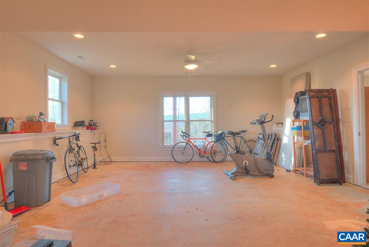 112 Creekside Court Ruckersville, VA 22968 - Photo 42 of 48 a view of a room with gym equipment