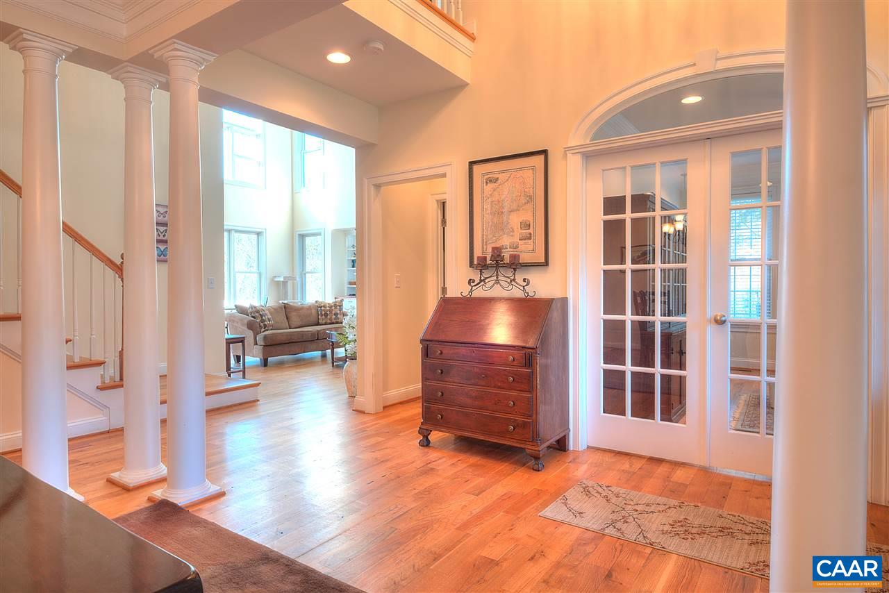 112 Creekside Court Ruckersville, VA 22968 - Photo 6 of 48 a view of living room filled with furniture and floor to ceiling window
