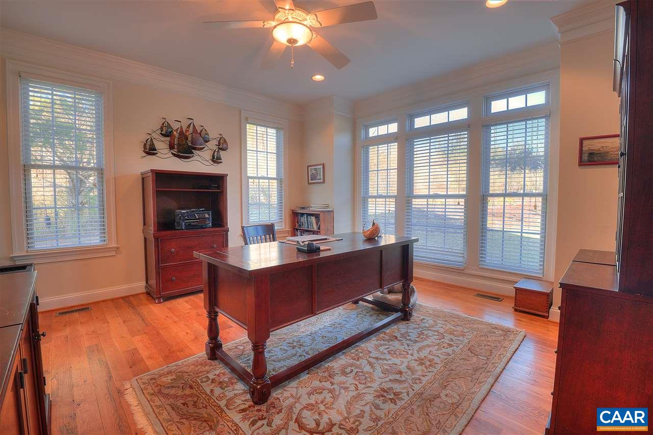 112 Creekside Court Ruckersville, VA 22968 - Photo 7 of 48 a living room with furniture and a fireplace