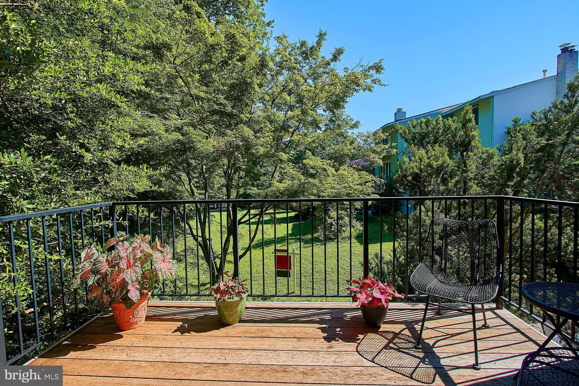 11444 Orchard Lane Reston, VA 20190 - Photo 12 of 30 a view of balcony with wooden floor and outdoor seating