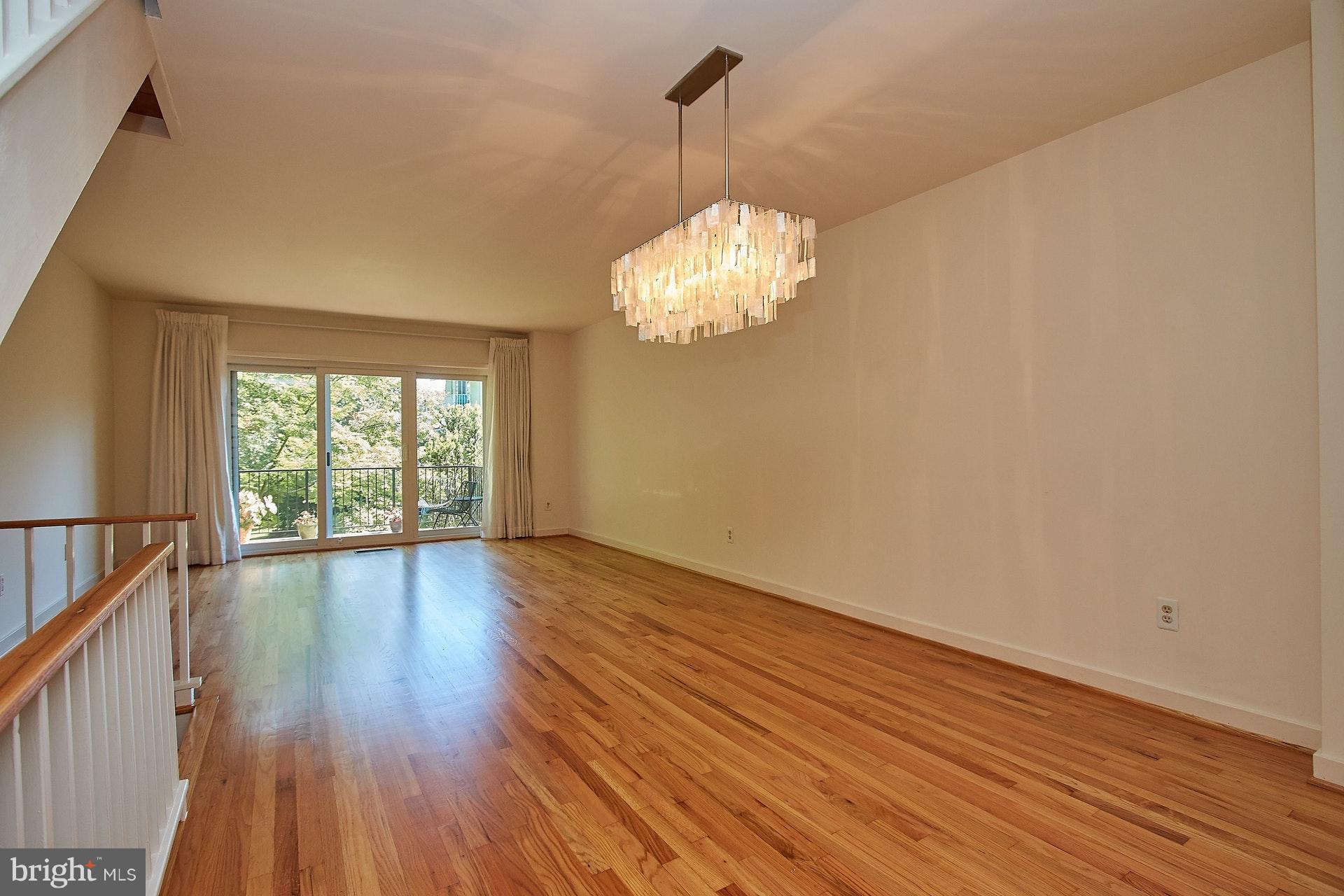 11444 Orchard Lane Reston, VA 20190 - Photo 8 of 30 a view of empty room with wooden floor and fan