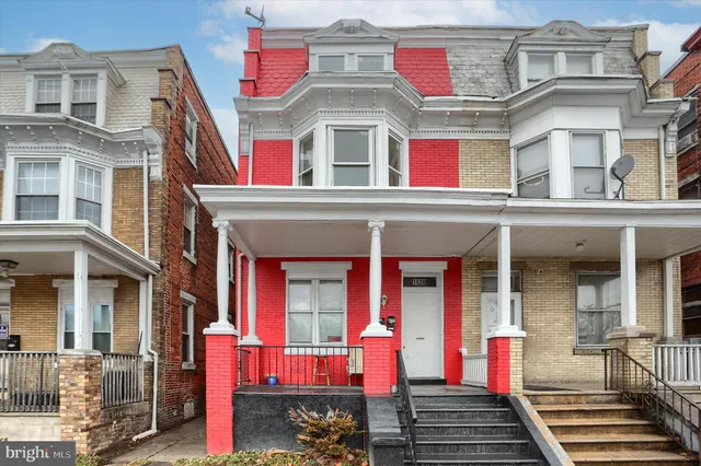 a front view of multi story residential apartment building