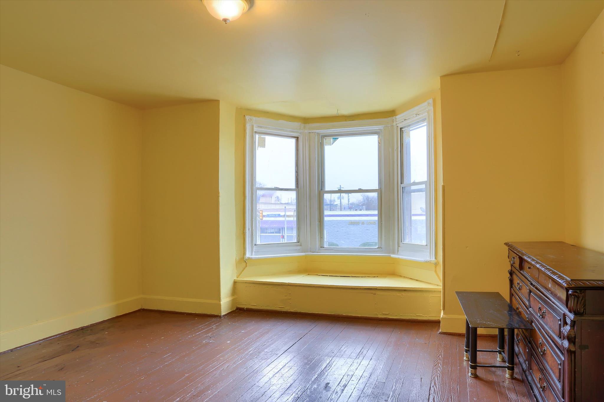 1420 State Street Harrisburg, PA 17103 - Photo 12 of 16 a view of room with lounge chair and windows