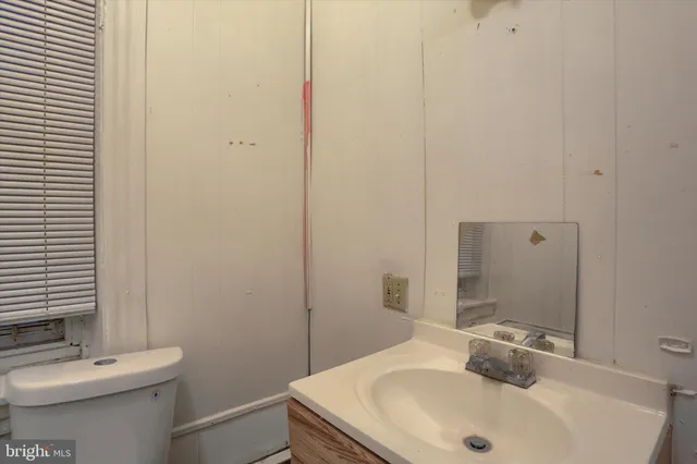 a bathroom with a sink and a toilet