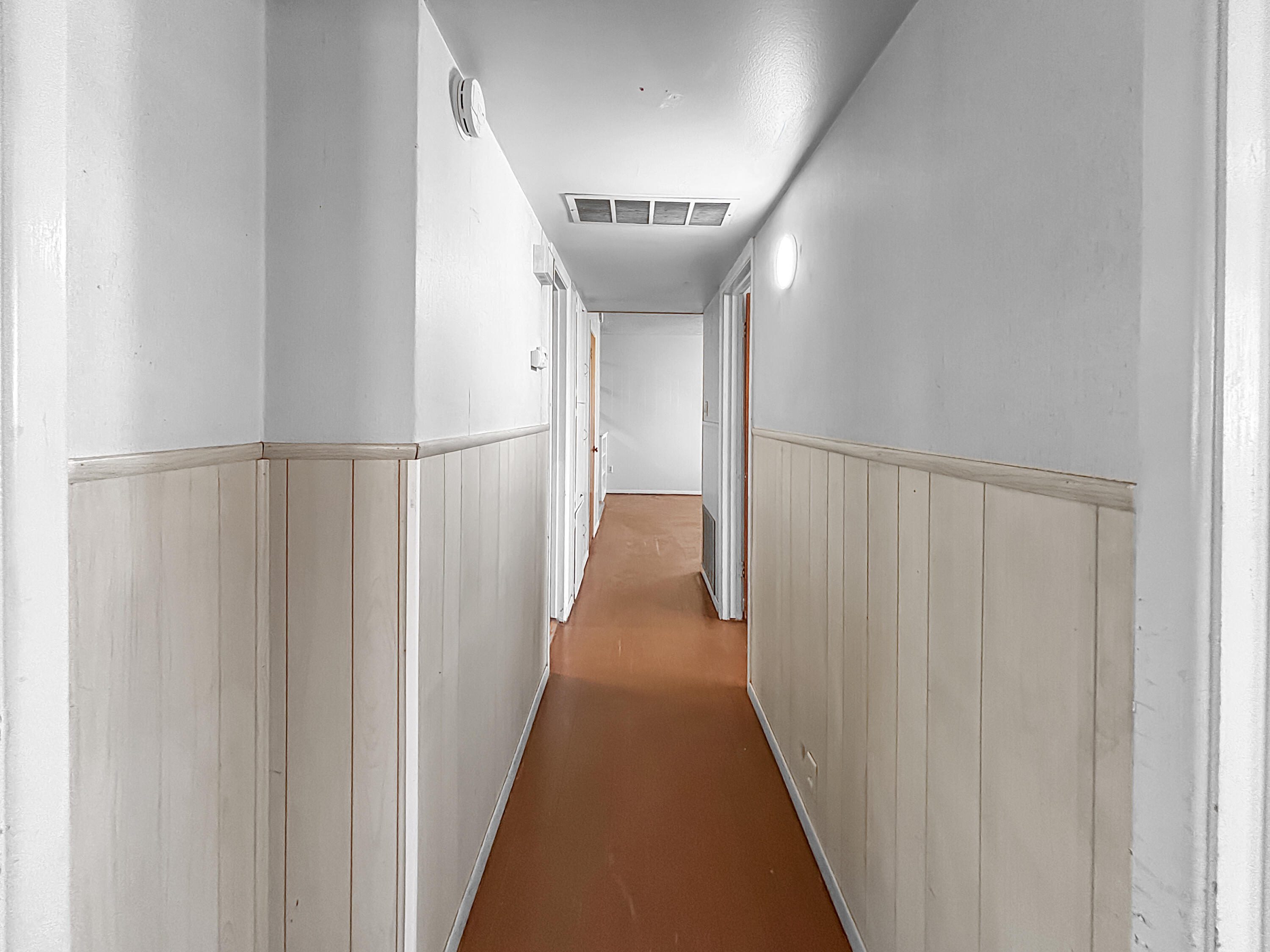 4411 45th Street Lubbock, TX 79414 - Photo 33 of 44 a view of a hallway with a white walls