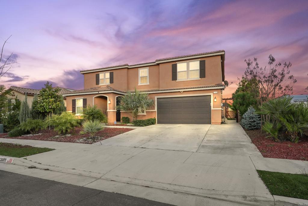 33009 Marin Fields Road Winchester, CA 92596 - Photo 1 of 51 a front view of a house with garden