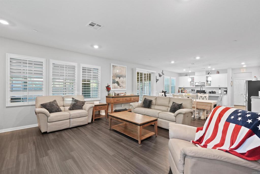33009 Marin Fields Road Winchester, CA 92596 - Photo 12 of 51 a living room with furniture and a large window
