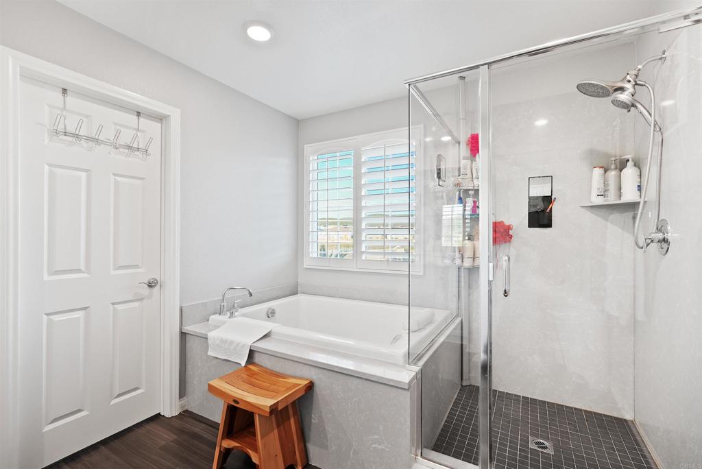 33009 Marin Fields Road Winchester, CA 92596 - Photo 29 of 51 a bathroom with a tub and shower