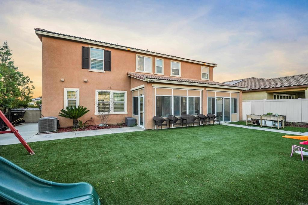 33009 Marin Fields Road Winchester, CA 92596 - Photo 38 of 51 a view of a house with a yard porch and sitting area