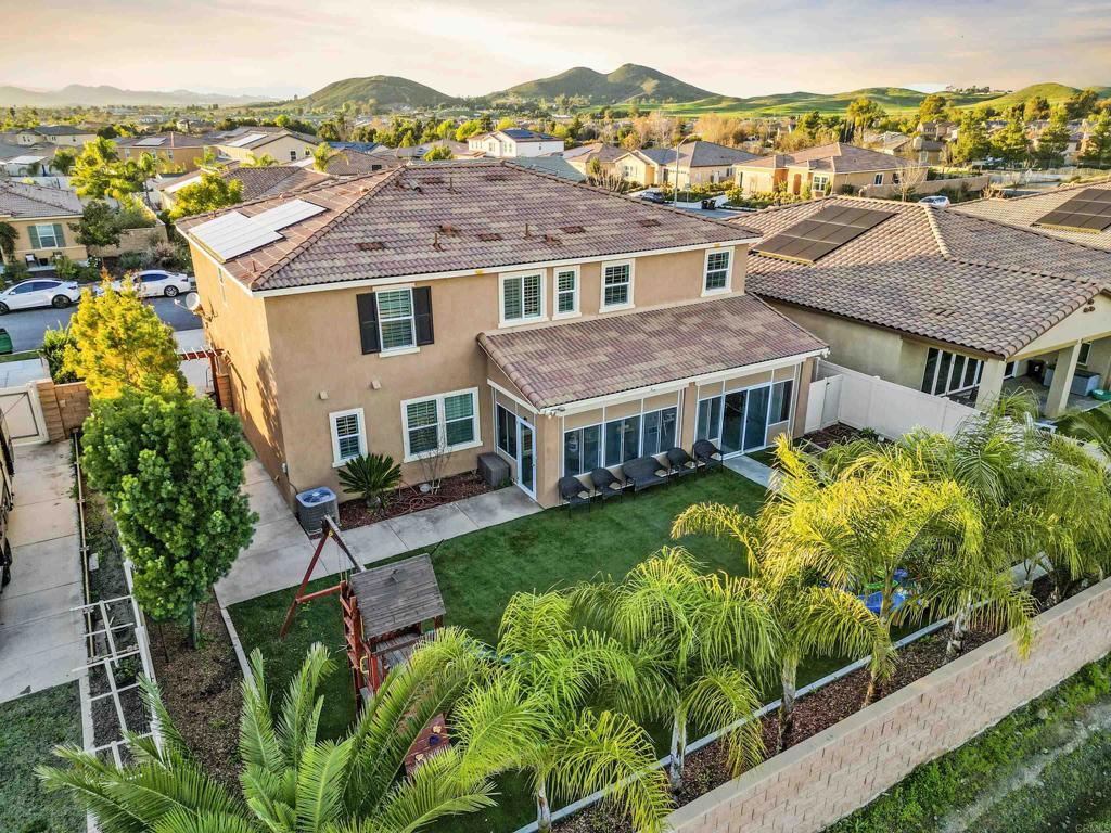 33009 Marin Fields Road Winchester, CA 92596 - Photo 44 of 51 an aerial view of a house with a garden and plants
