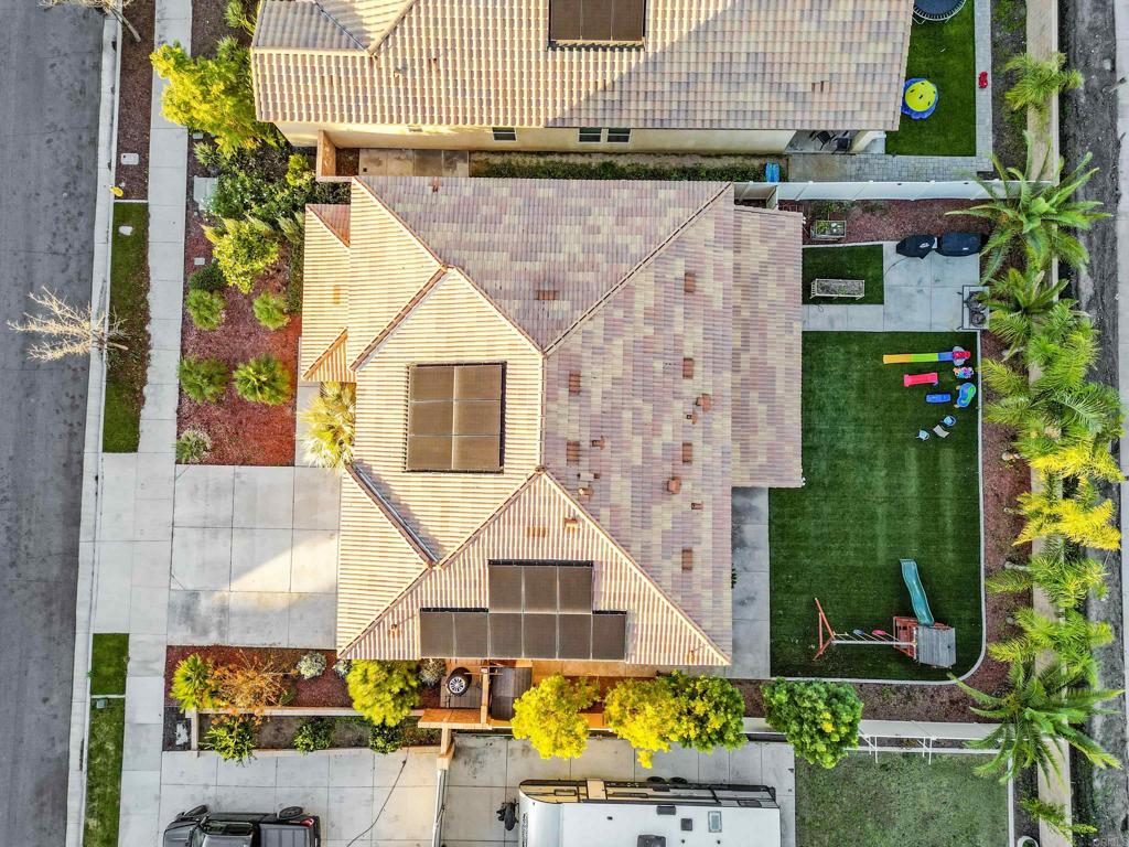 33009 Marin Fields Road Winchester, CA 92596 - Photo 45 of 51 an aerial view of a house with a yard and potted plants