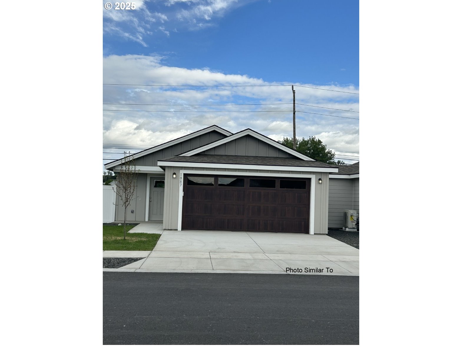 1184 Northeast 11th Street Hermiston, OR 97838 - Photo 1 of 23 a bathroom with a sink and a mirror