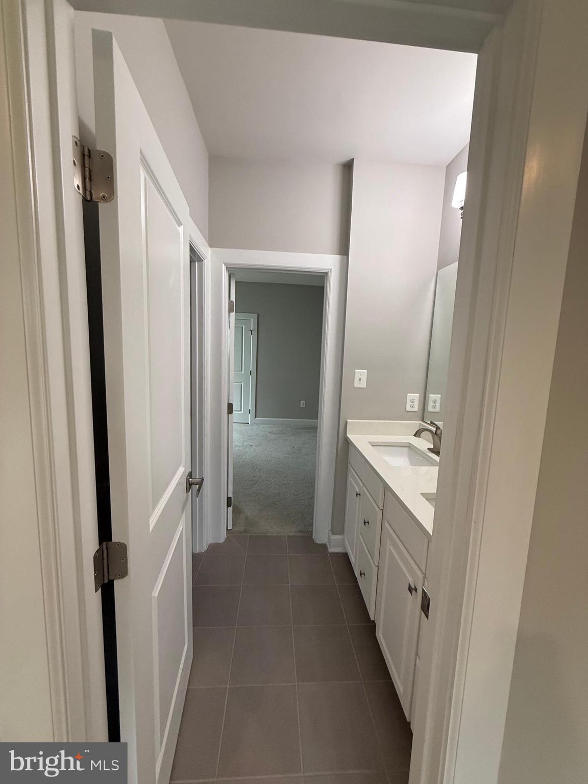 2575 Bailey Circle Philadelphia, PA 19115 - Photo 22 of 36 a bathroom with a double vanity sink toilet and shower