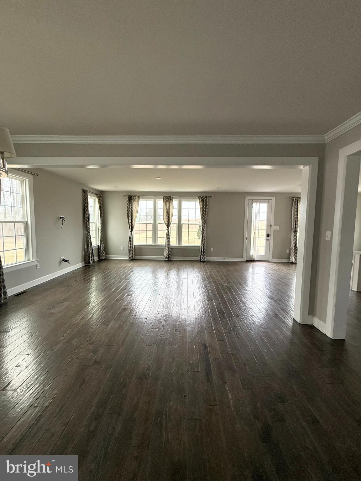 2575 Bailey Circle Philadelphia, PA 19115 - Photo 6 of 36 wooden floor in an empty room with a window