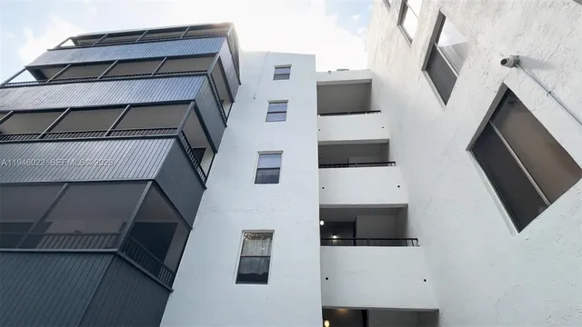 a house view with a backyard space