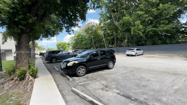a view of a livingroom with wooden floor